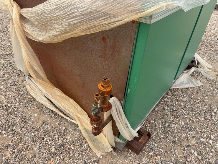 large-industrial-metal-cabinet-with-piping-and-protective-wrap-image-3