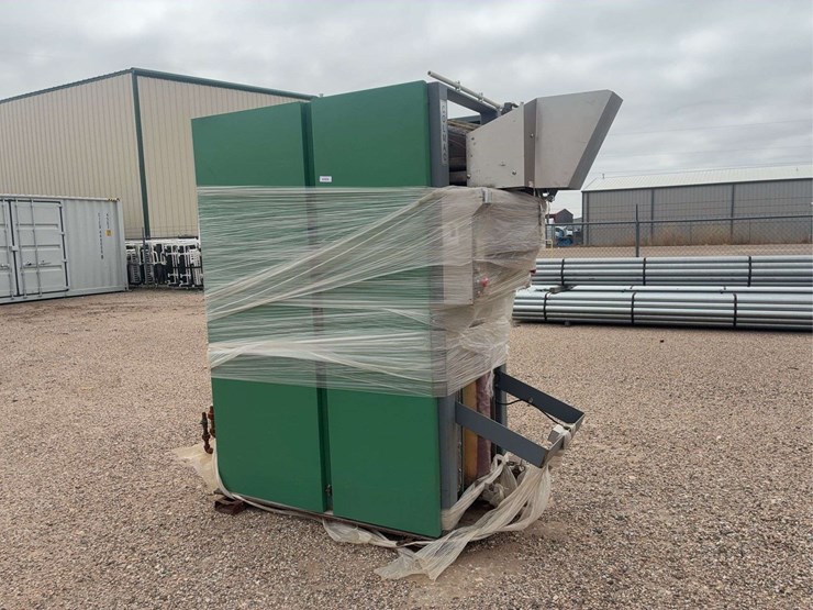 large-industrial-metal-cabinet-with-piping-and-protective-wrap-image-1