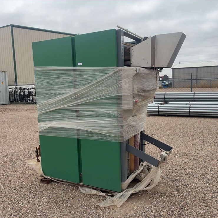 Large Industrial Metal Cabinet with Piping and Protective Wrap