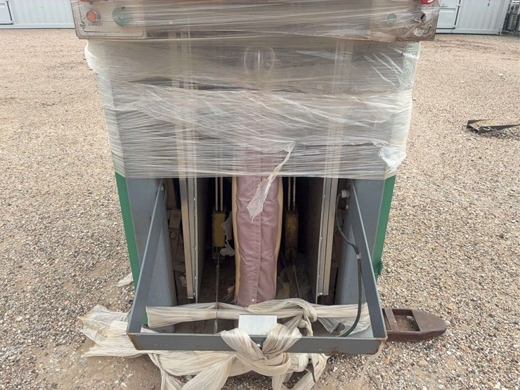 large-industrial-metal-cabinet-with-piping-and-protective-wrap-image-8