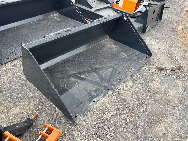 #83-•-unused-66”-skid-steer-smooth-bucket-image-1