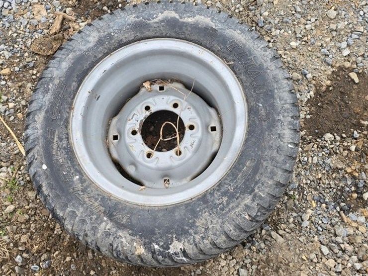 new-1-titan-27x10.50-tire-&-rim-image-4