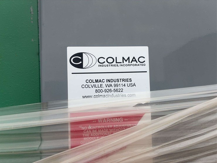 large-industrial-metal-cabinet-with-piping-and-protective-wrap-image-6