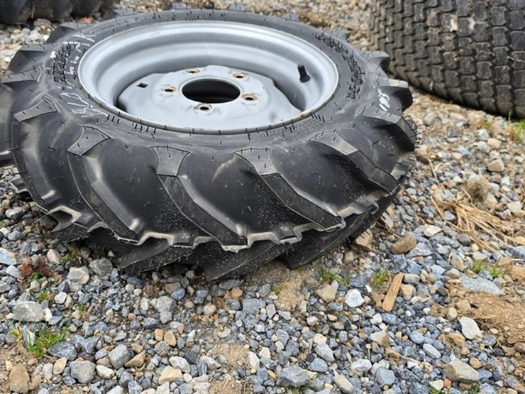 new-1-titan-6-12-tire-&-rim-image-1