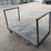 heavy-duty-steel-platform-cart-with-dual-handles-and-four-wheels-image-3