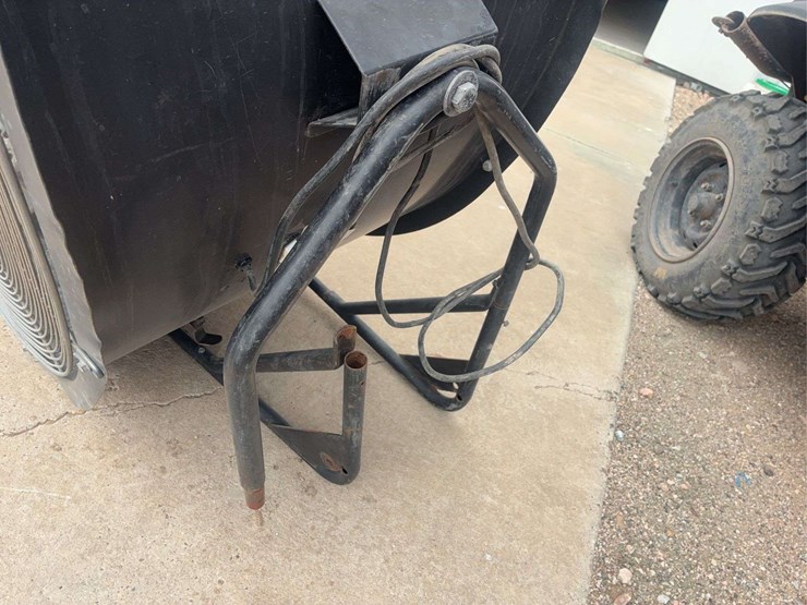 large-industrial-floor-fan-with-metal-frame-and-red-blades-image-4