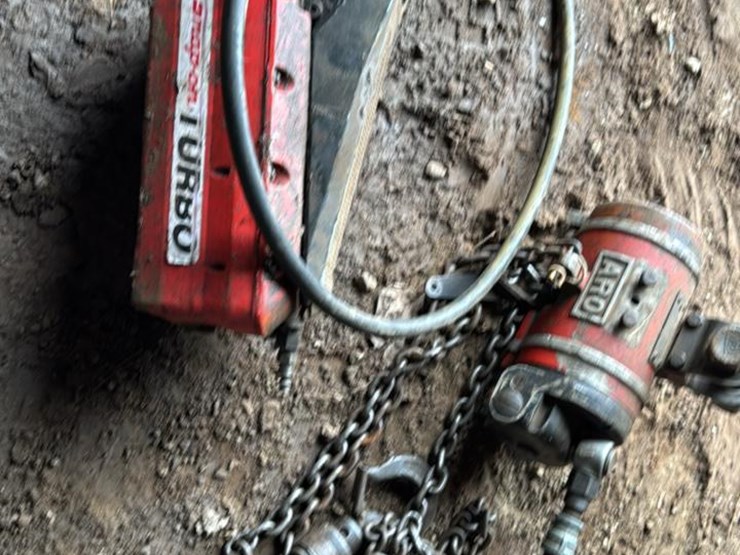 #244-•-turbo-pneumatic-foot-pump,-and-1/2-ton-hoist-image-1