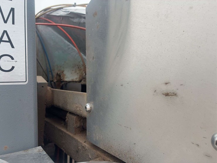 large-industrial-metal-cabinet-with-piping-and-protective-wrap-image-10