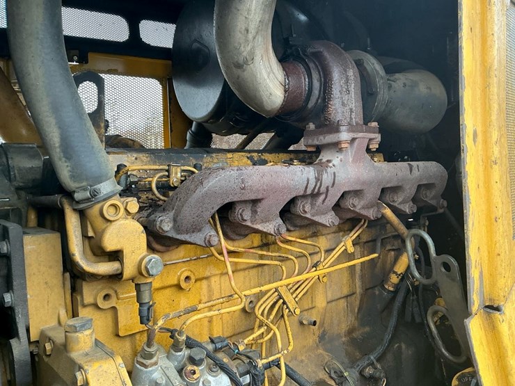 2012-deere-648-image-12