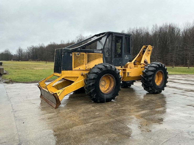 2012-deere-648-image-1