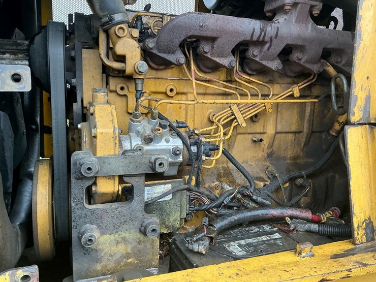 2012-deere-648-image-10