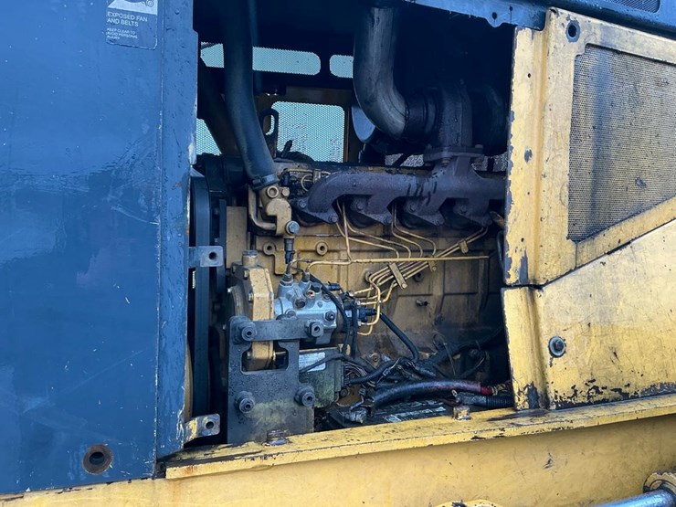 2012-deere-648-image-9