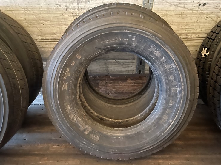 #10744-•-(2)-recapped-semi-tires-image-1