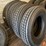 #10743-•-(4)-recapped-semi-tires-image-1