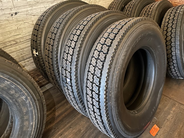 #10743-•-(4)-recapped-semi-tires-image-1