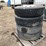#10748-•-(4)-semi-tires-on-aluminum-rims-image-1