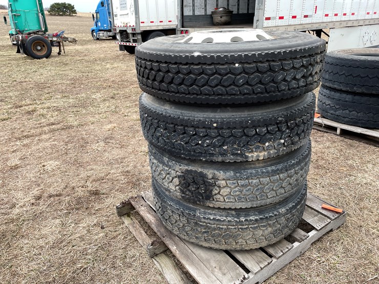 #10748-•-(4)-semi-tires-on-aluminum-rims-image-1