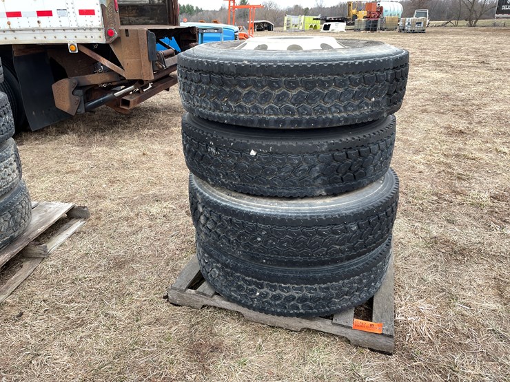#10747-•-(4)-semi-tires-on-aluminum-rims-image-1