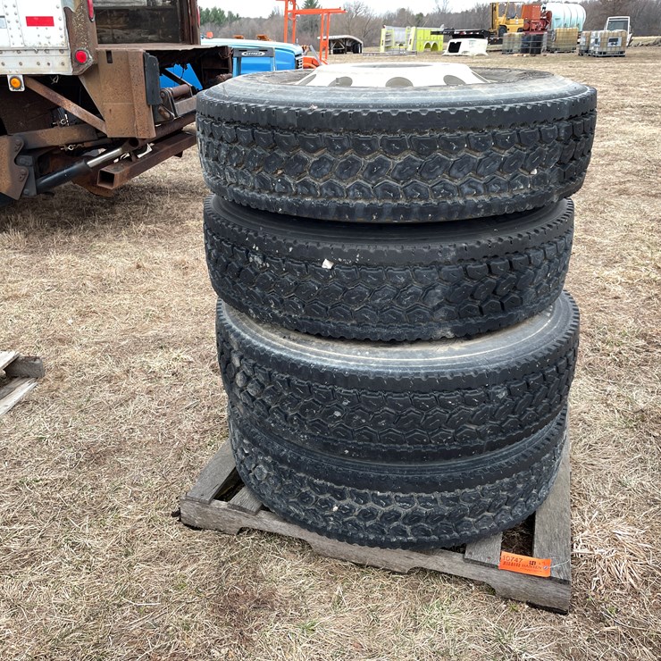 #10747 • (4) Semi Tires on Aluminum Rims