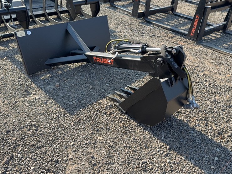 #2078-•-skid-steer-stationary-backhoe-image-1