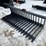 #2047-•-skid-steer-mount-skeleton-bucket-image-1