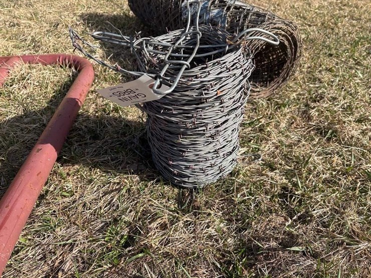 partial-roll-of-barb-wire-&-cyclone-fence-image-2