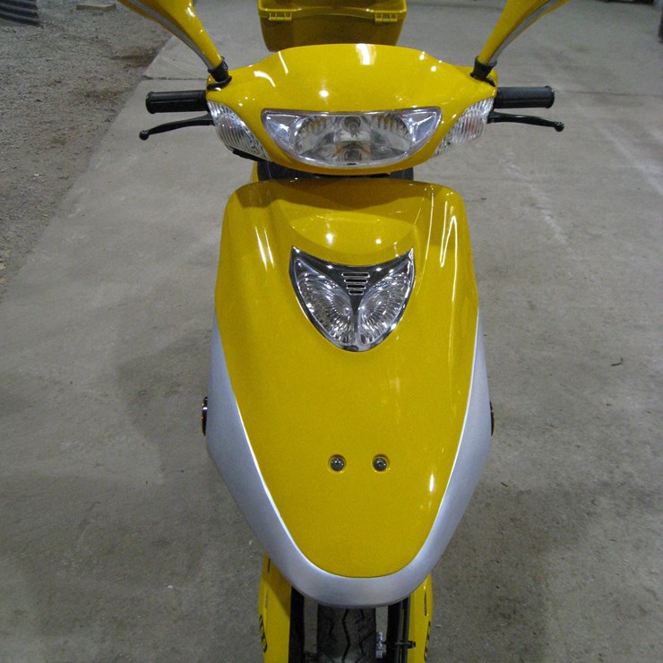 Seller #13.  Wildfire scooter R8 WFH 50 with storage box, 272 miles, new battery, yellow, have cover & title, always been inside