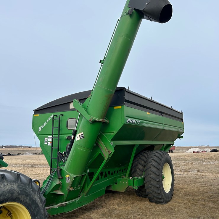 Seller #37.  Brent Avalanche grain cart, 1084, 3 large sight glasses, roll tarp, traction dual tires, nice later model grain cart, plus other options