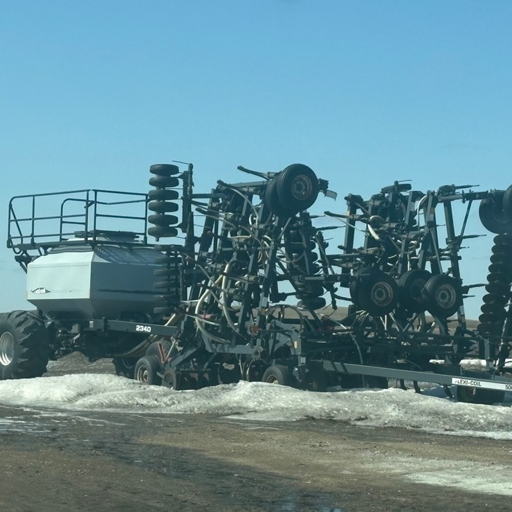 Seller #39.  45’ Flexcoil 2340 airseeder, 40 series, 9” spacing (80%) eagle beaks, rubber wheel packers, rollers for soybeans, wheat, canola roller, monitors, 5,000 seeding tool, hoses & tires all good, very good condition