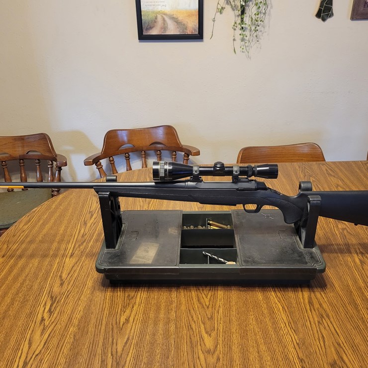 13.	Browning A-bolt, 300 Win Mag. Leupold Vari-XII