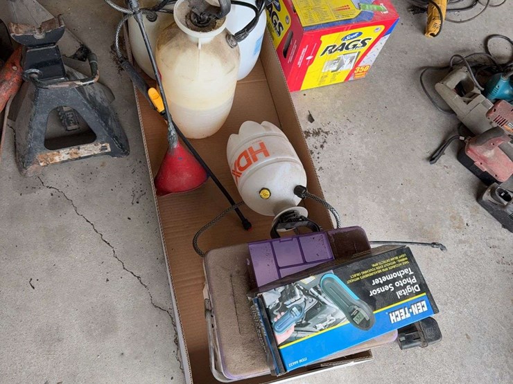 lot-of-garden-sprayers,-funnel,-tachometer,-and-rags-image-1