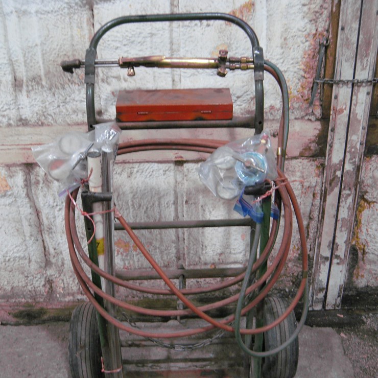 Seller #13.  Acetylene torch and stand w/ brass rods, welding rods
