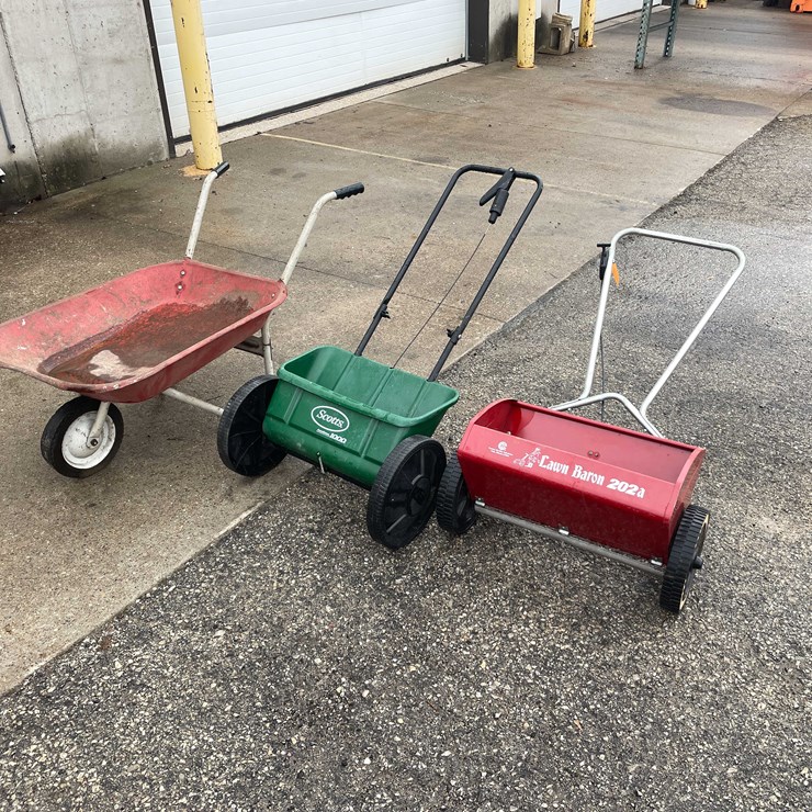 #7021 • (2) Fertilizer Spreaders and Wheelbarrow (O3)