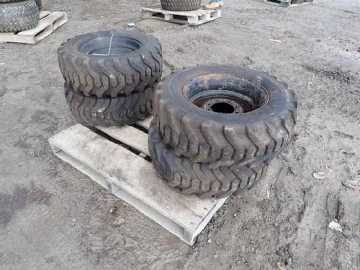 qty-of-(4)-titan-10-16.5-tire(s)-&-rim(s)-image-4