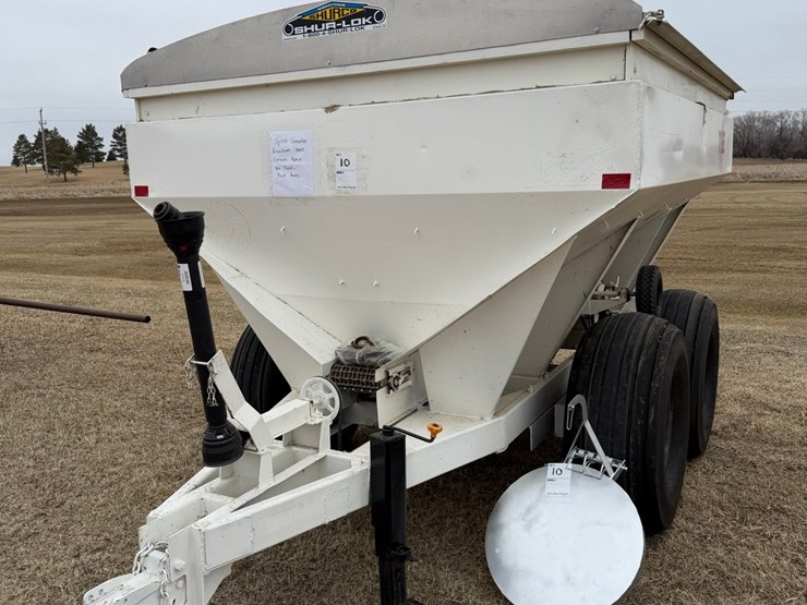 seller-#10.-•	6-ton-tyler-fertilizer-spreader,-stainless-steel-box,-twin-beaters,-40’-spread,-brand-new-tires,-(walking-tandems),-roll-tarp,-looks-great,-excellent-shape,-always-shedded-image-2