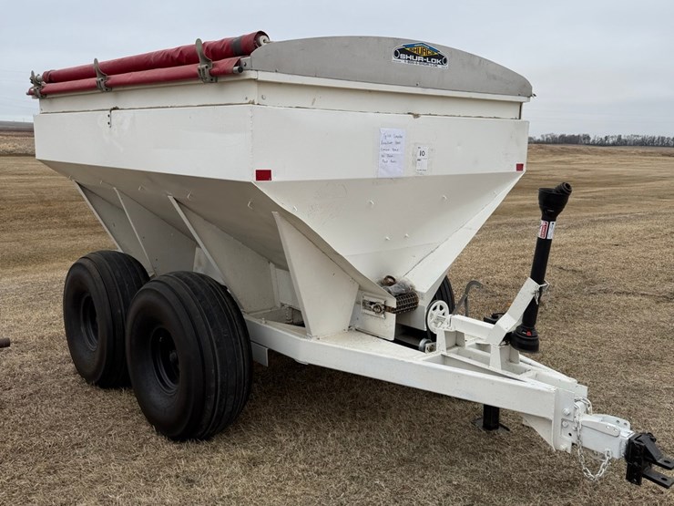 seller-#10.-•	6-ton-tyler-fertilizer-spreader,-stainless-steel-box,-twin-beaters,-40’-spread,-brand-new-tires,-(walking-tandems),-roll-tarp,-looks-great,-excellent-shape,-always-shedded-image-1