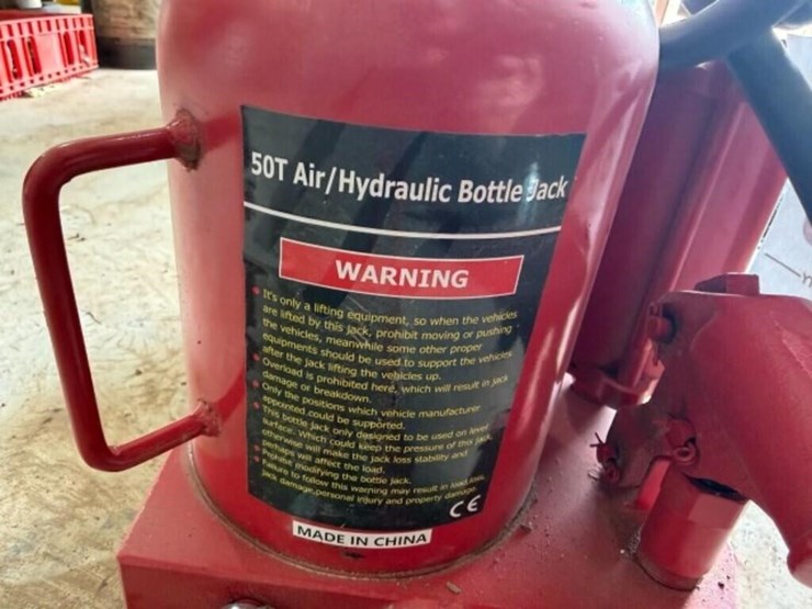50-ton-air/hydraulic-bottle-jack--works/operates-image-2