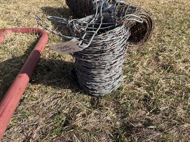 partial-roll-of-barb-wire-&-cyclone-fence-image-2