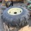 tiron-16.9-24-tire-w/-8-lug-rim-(single)-image-1