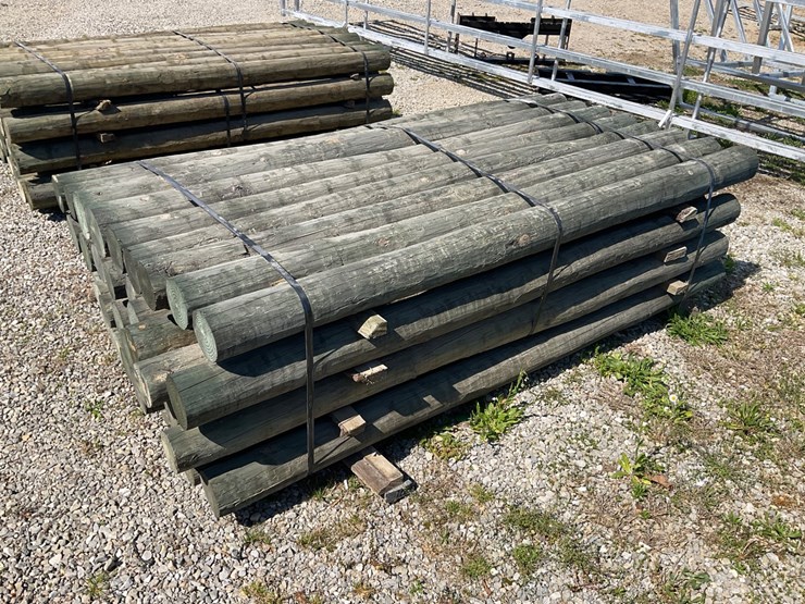 #97-•-4”x7’-treated-wooden-fence-posts-image-2
