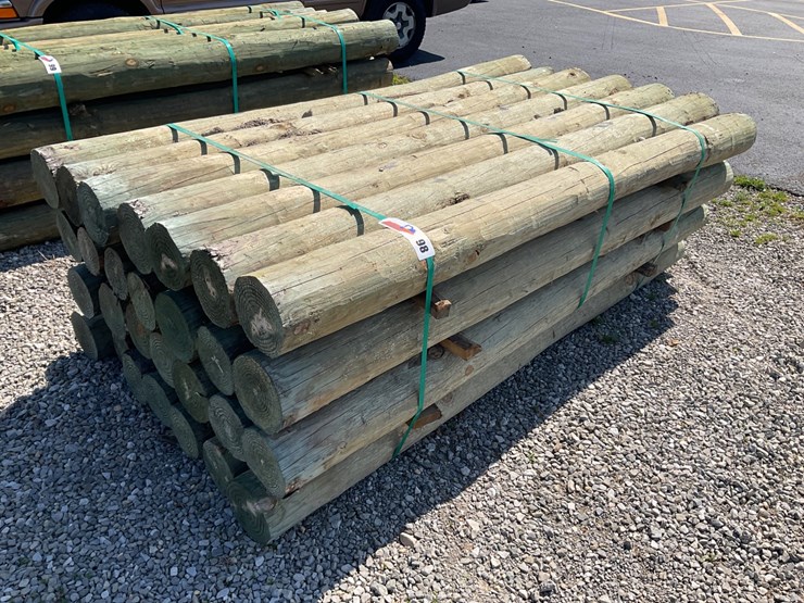 #98-•-6”x7’-treated-wooden-fence-posts-image-1