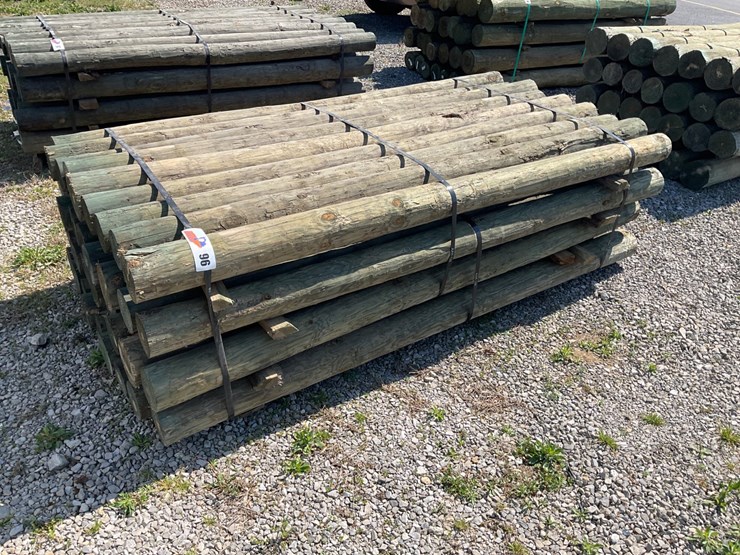 #96-•-4”x7’-treated-wooden-fence-posts-image-1
