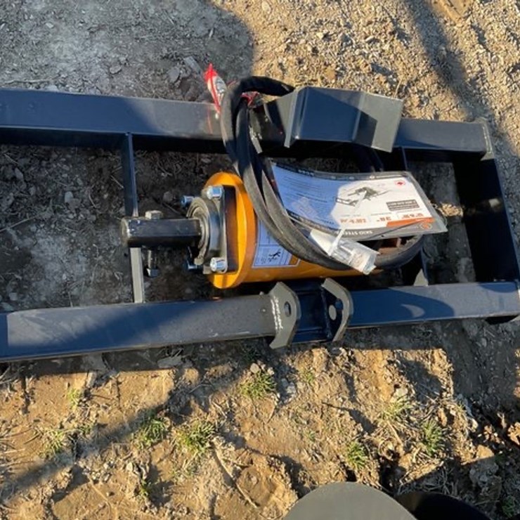 #55 • Unused Wolverine Skid Steer Auger Drive & Bit Attachment with 2 Augers