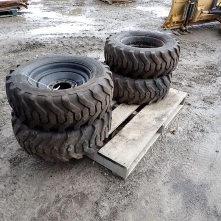 Qty Of (4) Titan 10-16.5 Tire(s) & Rim(s)