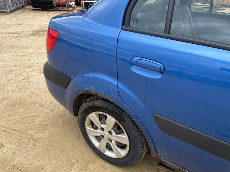 #506-•-2009-kia-rio-lx-(has-wi-title)-image-22