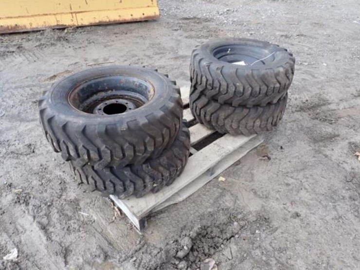 qty-of-(4)-titan-10-16.5-tire(s)-&-rim(s)-image-3