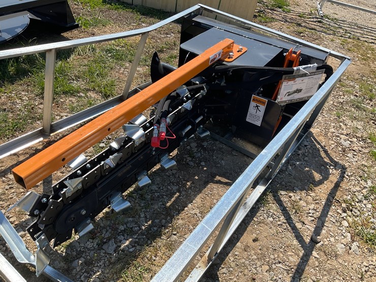 #67-•-unused-wolverine-skid-steer-trencher-attachment-image-1