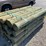 #99-•-6”x7’-treated-wooden-fence-posts-image-1