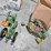 #973-•-box-of-assorted-small-toy-tractors-image-1