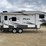 #201-•-2014-palomino-puma-253-fbs-27'-fifth-wheel-camper-(has-wi-title)-image-2
